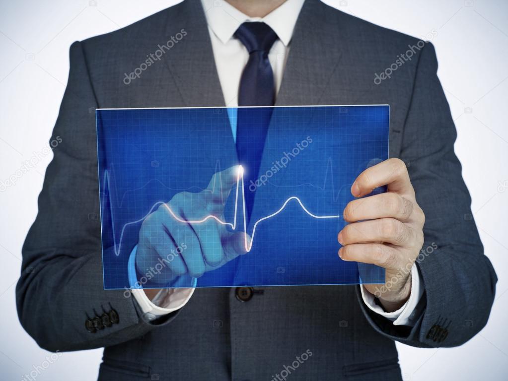 Man with digital electrocardiogram