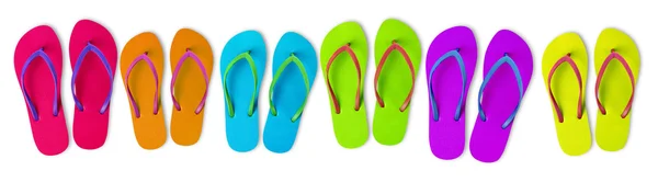 Tongs multicolores sur blanc — Photo