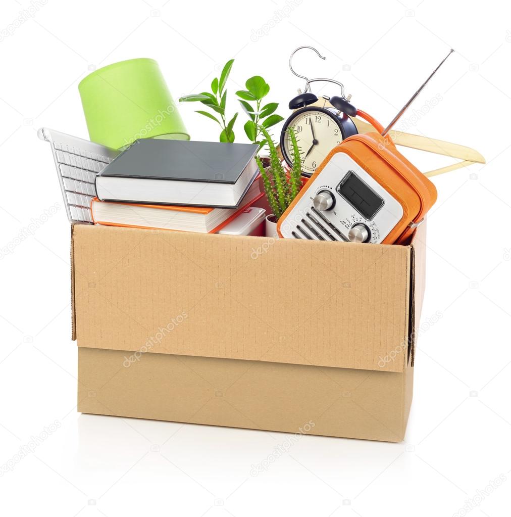Cardboard box full with household stuff