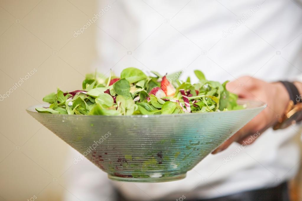 Waiter with salad