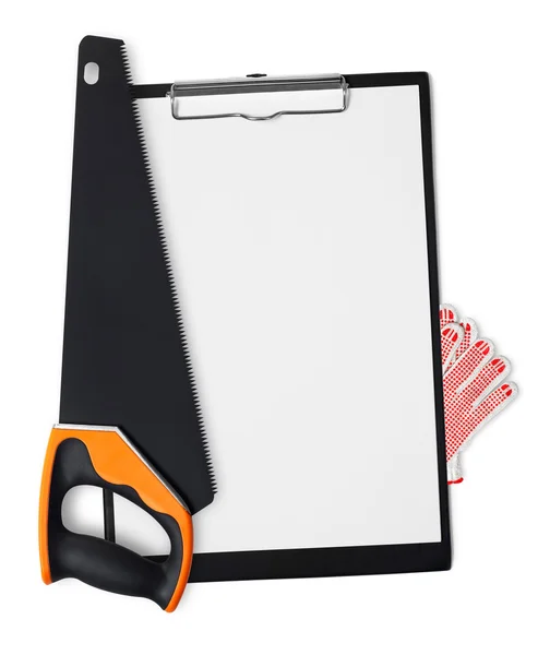 Saw and gloves on clipboard — Stock Photo, Image