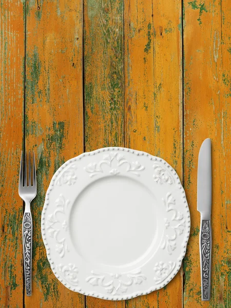 Table setting on wood table — Stock Photo, Image