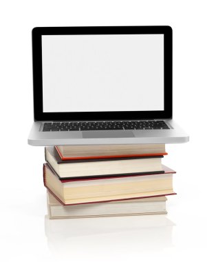 Bir kitap yığını üstünde laptop