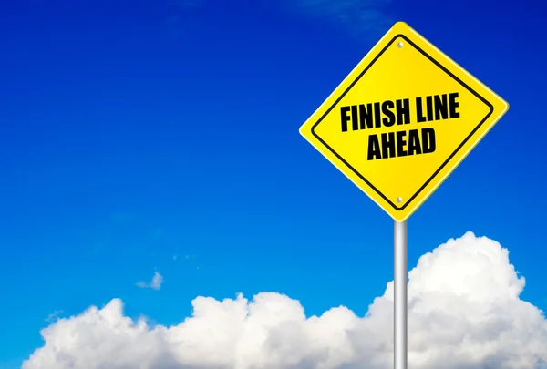 Finish line ahead message on road sign — Stock Photo, Image