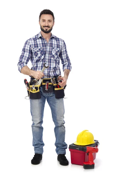 Trabajador de construcción con llave inglesa — Foto de Stock