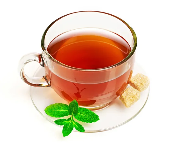 Cup of tea with mint and sugar — Stock Photo, Image