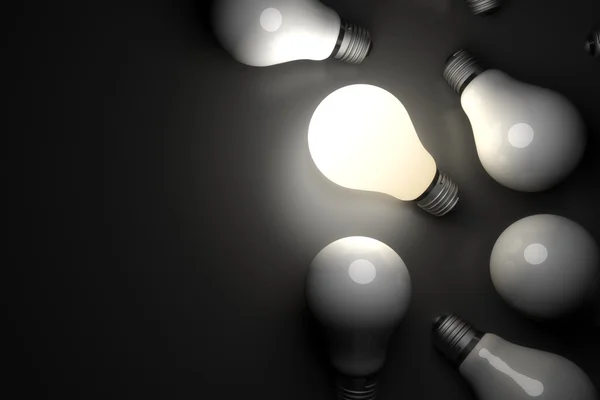 Light bulb glowing — Stock Photo, Image