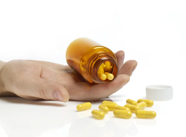Sovradosaggio pillole su bianco — Foto Stock