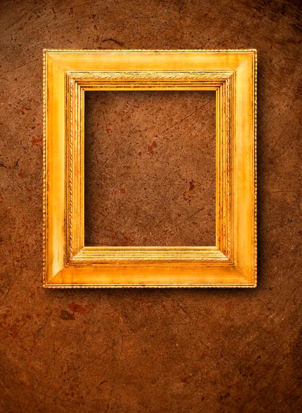 Golden frame on grunge background — Stock Photo, Image