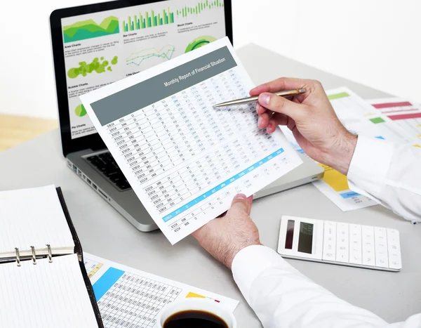 Businessman analysing financial plan — Stock Photo, Image