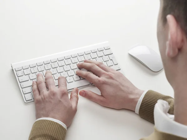 Typing on computer keyboard — Stock Photo, Image