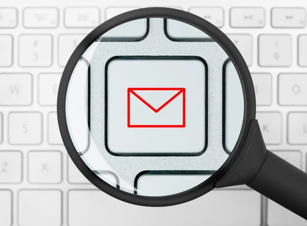 Mail icon under the magnifying glass — Stock Photo, Image