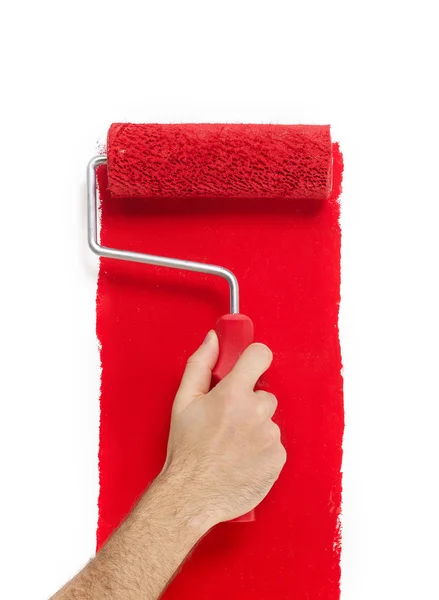 Hand with paint roller — Stock Photo, Image