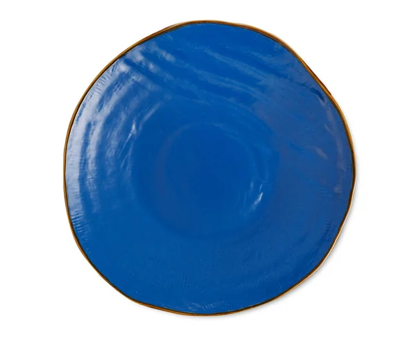 Blauer Teller auf weiß — Stockfoto