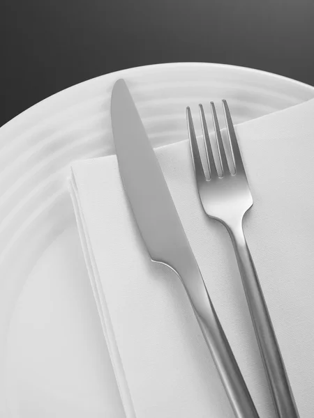 Dinner setting on black background — Stock Photo, Image