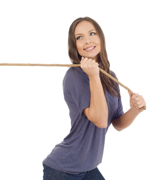 Adolescente puxando uma corda — Fotografia de Stock