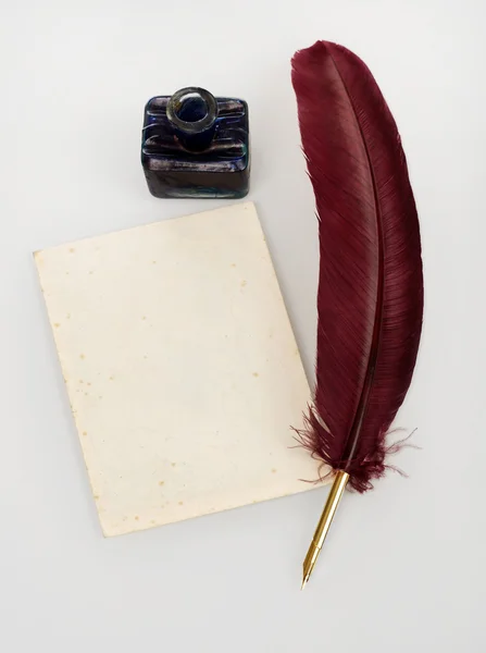Quill, letter and ink well