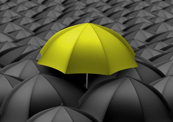 Gele paraplu boven zwarte paraplu 's — Stockfoto