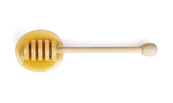 Honey dipper on white — Stock Photo, Image