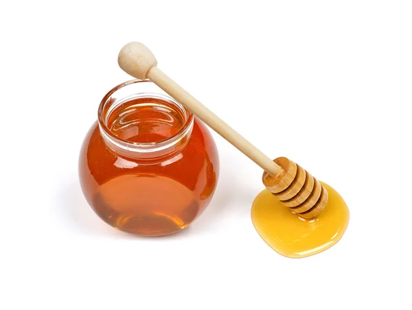 Honey jar and dipper — Stock Photo, Image