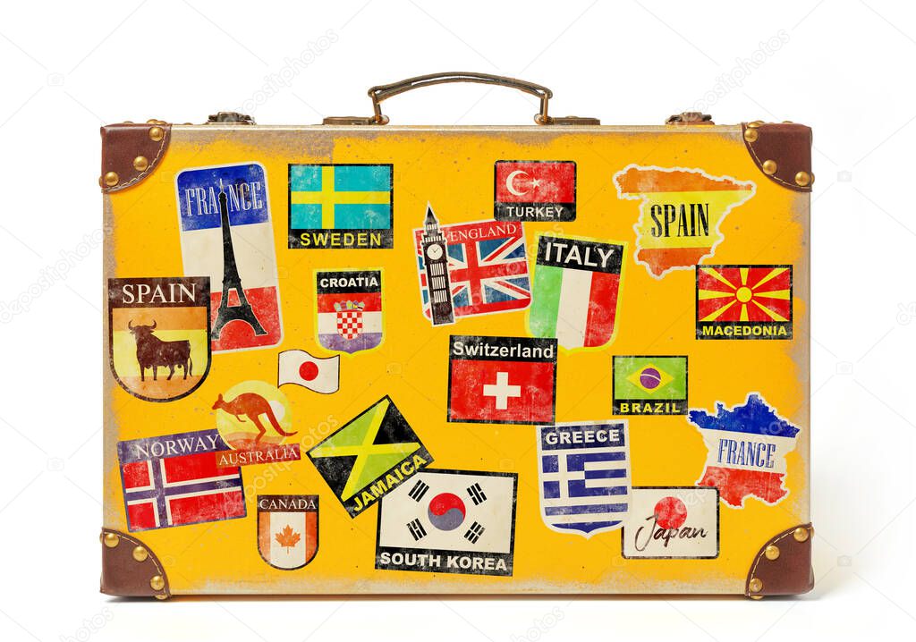 Yellow luggage with country stickers on white background