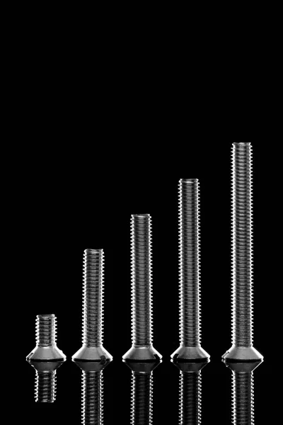 Fém Csavarok Chart Fekete Háttér — Stock Fotó