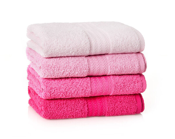 Pink towels stack on white background