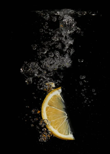 Lemon Splashing Water Black Background — Stock Photo, Image