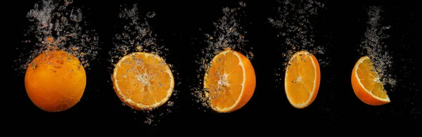 Πιτσιλιές Πορτοκαλιού Νερό Μαύρο Φόντο — Φωτογραφία Αρχείου