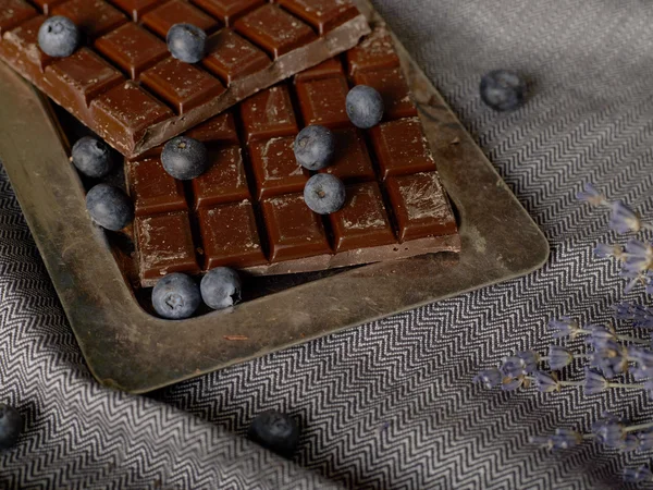 Chocolate and blueberries — Stock Photo, Image