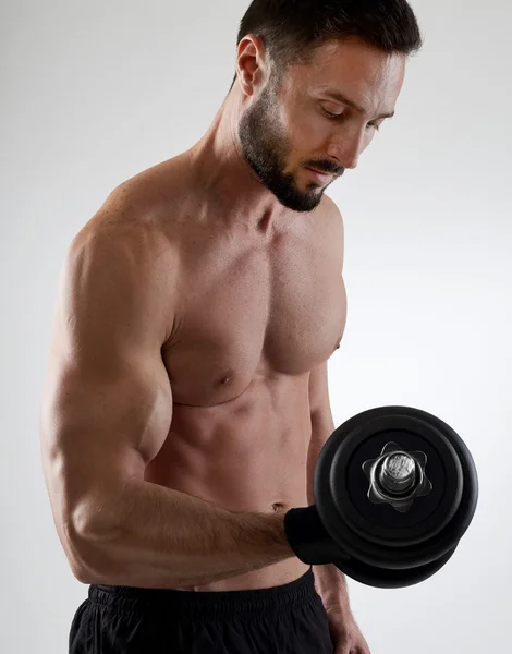 Man lifting weights — Stock Photo, Image