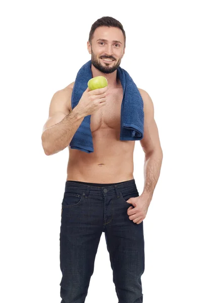 Deportista sosteniendo una manzana — Foto de Stock