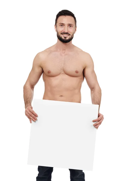 Uomo senza camicia con segno bianco — Foto Stock