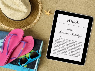eBook tablet on beach clipart