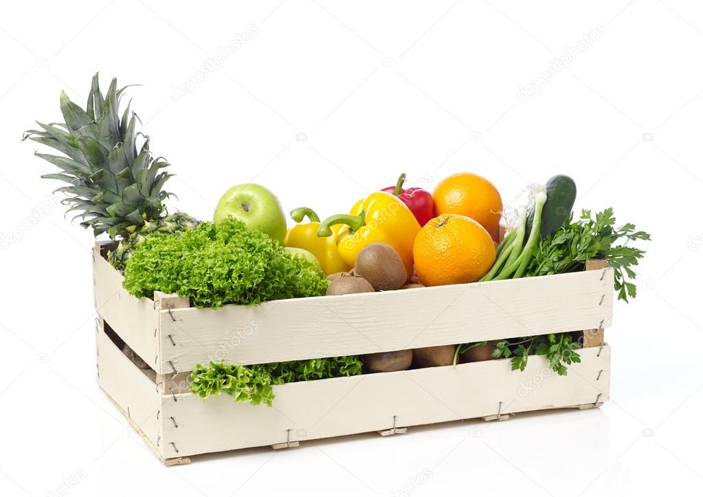 Fruits and vegetables on wooden crane