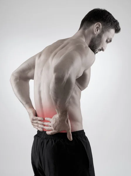 Dolor de espalda, fondo gris — Foto de Stock