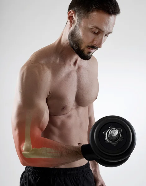 Weightlifting injury, gray background — Stock Photo, Image