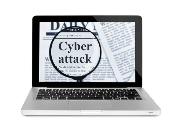 Ataque cibernético sob lupa em um laptop — Fotografia de Stock
