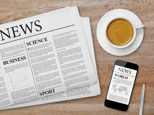 News page on tablet, newspaper and coffee — Stock Photo, Image