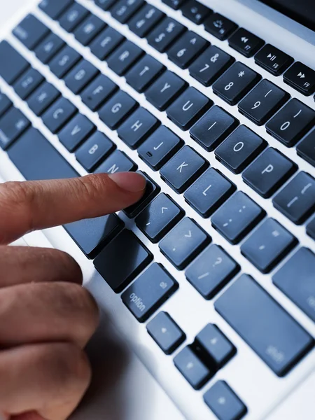 Finger on keyboard — Stock Photo, Image