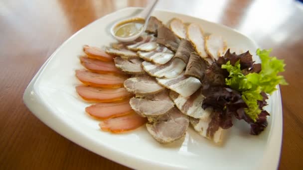 Meat delicatessen plate — Stock Video