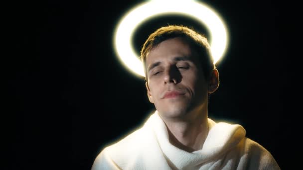Holy man with a halo above his head — Stock Video