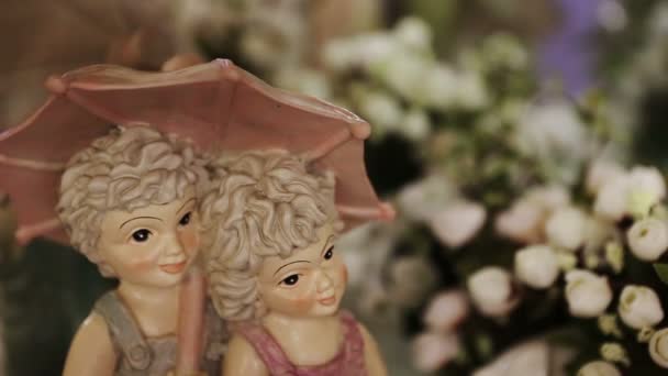 Boy and Girl Under Umbrella — Stock Video