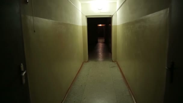 Walks Down the Creepy Hallway — Stock Video