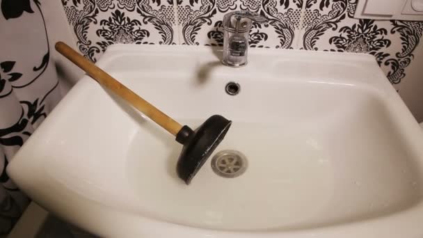 Sink and a Plunger — Stock Video