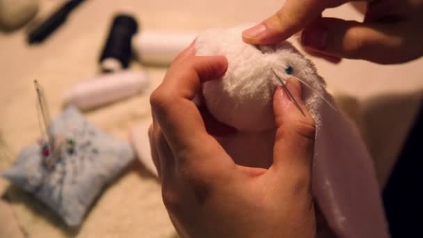 Woman Sewing a Toy — Stock Video