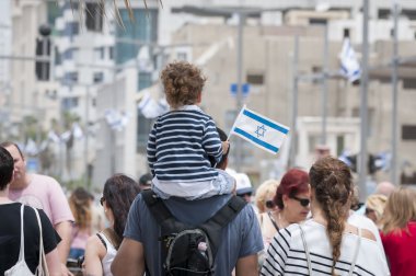 Father and child on Israel's Independence day. clipart