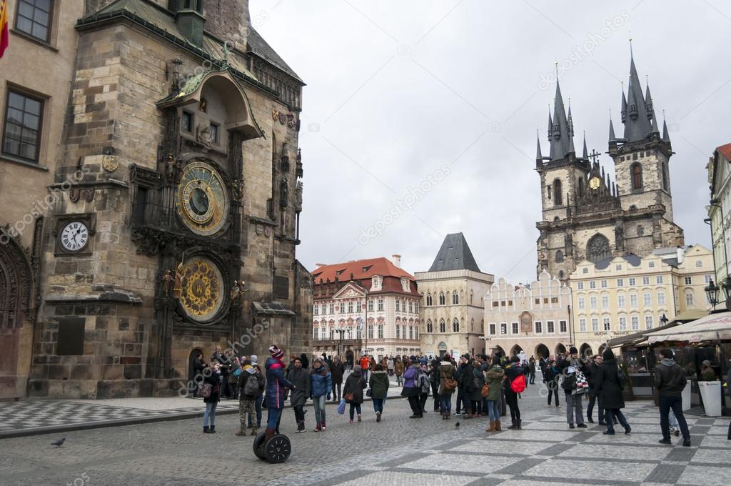 Tourists visiting the Old Town square at the Prague city center
