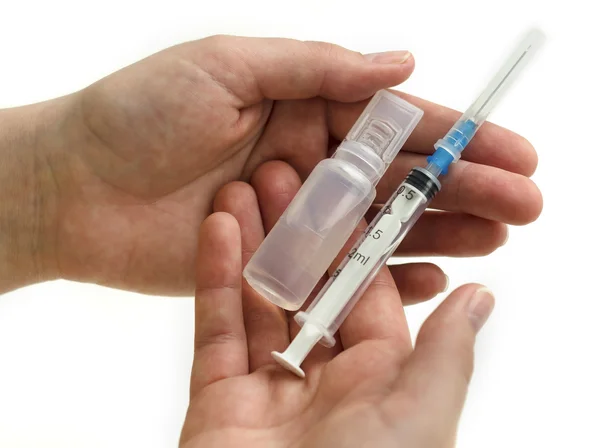Composition with a syringe and vial — Stock Photo, Image