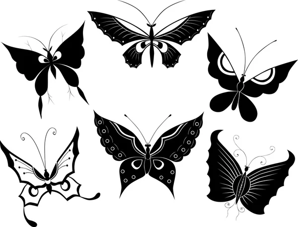 Siluetas de las mariposas — Vector de stock